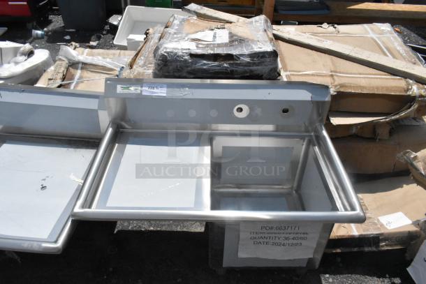 BRAND NEW Regency 600S1181818L stainless steel single bay sink with left side drain board, no legs, in scratch and dent condition.
