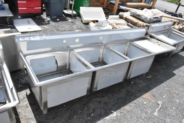 BRAND NEW Regency 600S3242424R stainless steel 3-bay sink with right side drain board, no legs, scratch and dent condition.