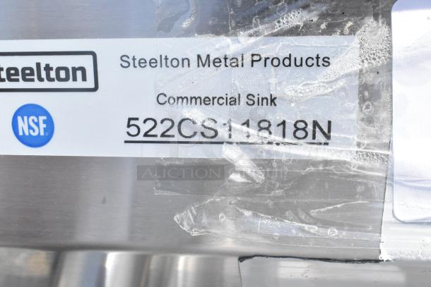 Steelton 522CS11818N commercial sink label, showing model number and NSF mark. New with scratches and dents.
