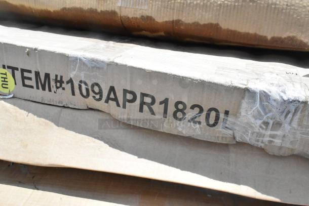 Cardboard packaging with text "ITEM#109APR1820L" visible, possibly containing new scratch and dent items like pan rack and stainless table.