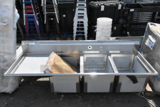 Brand new Regency 3 bay stainless steel sink, model 600S3182424L, with left side drainboard. Scratch and dent condition.