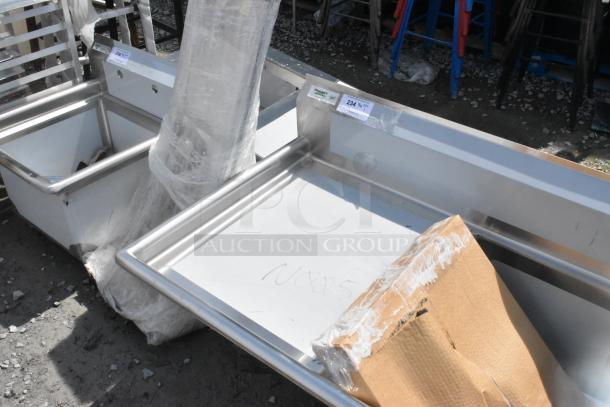BRAND NEW SCRATCH AND DENT Regency 600S3182424L stainless steel 3 bay sink with left side drain board, tags attached.