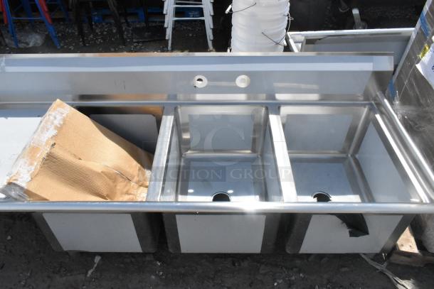BRAND NEW Regency 600S3182424L Stainless Steel 3 Bay Sink with left side drain board, scratch and dent condition.