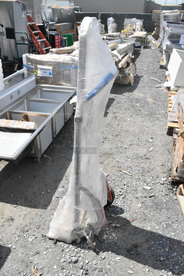 Brand new Lavex 257SBHTS hand truck, 550 lb capacity, aluminum, 10" pneumatic wheels, stair climbers, wrapped for protection.