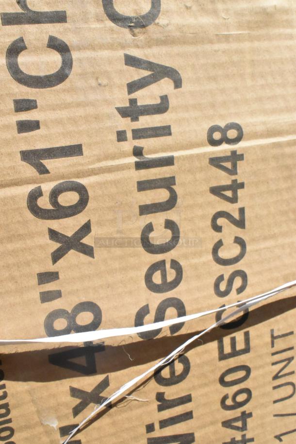Cardboard box with visible text indicating dimensions, "48”x61”," and model number, "SC2448," likely containing new scratch and dent items.
