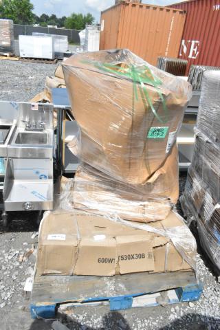 Plastic-wrapped items including a stainless steel table and base columns, labeled "600WTS30X30B," on a blue pallet.