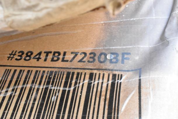 Barcode and label on packaging for item #384TBL7230BF, indicating a scratch and dent auction lot.