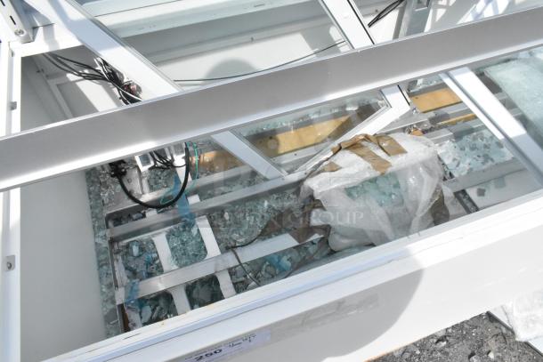 Avantco 193BCFD72W bakery display case, 70 7/8" white, with LED lighting, visible broken glass, 120V, 1 phase.