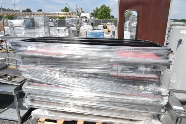 Pallet of round table trolley parts, wrapped in plastic, in used condition. Ideal for bulk purchase. Lot number 252 visible.
