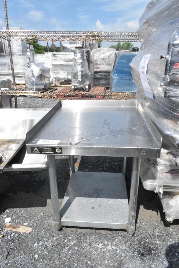 Stainless steel equipment stand with a metal under shelf; features Aero brand labels, NSF certification, good condition.