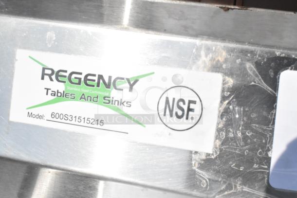 Regency 600S31515215 stainless steel 3 bay sink label, NSF certified, features dual drain boards, no legs included.