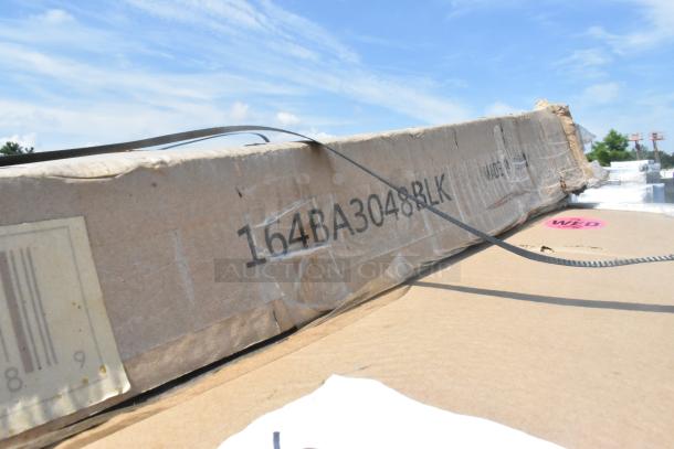 Cardboard box with model number 164BA3048BLK, containing scratch and dent items including a stainless table and Dormont gas hose.
