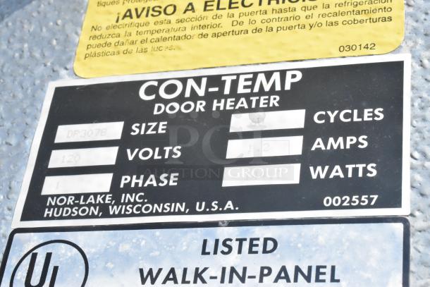 Close-up of Norlake freezer label showing model DP3078, 120 volts, 1 phase, indicating USA manufacture.