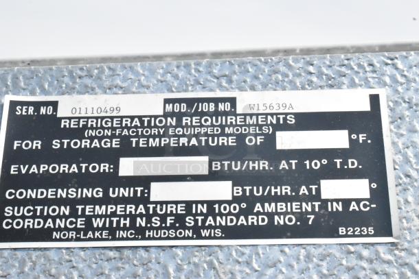 Norlake Walk-In Freezer label showing model W15639A and serial 01110499. Includes refrigeration requirements and NSF compliance.