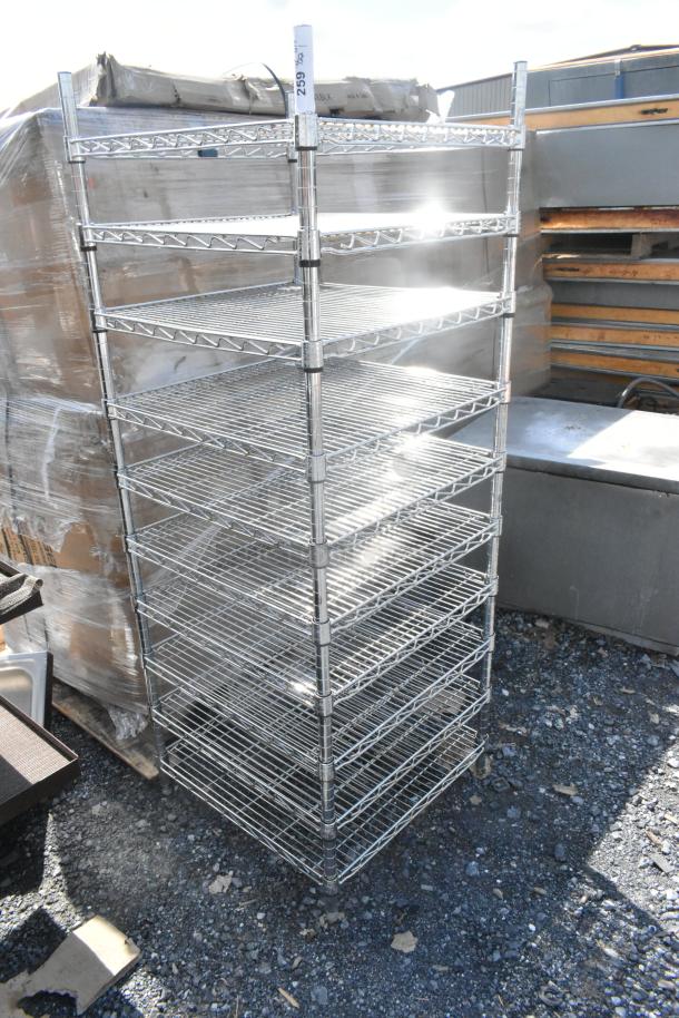 Chrome finish 10-tier wire shelving unit. Buyer must dismantle. Consider freight charges. Suitable for warehouse storage.