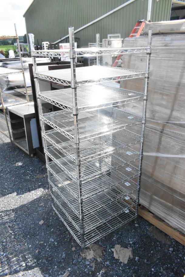 10-tier chrome finish wire shelving unit, excellent condition, requires dismantling by buyer. Suitable for freight.