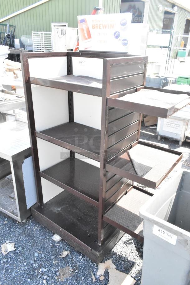 Brown metal shelving unit with four shelves, sliding trays, and white backing. Industrial design, suitable for storage.