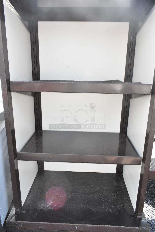Brown metal shelving unit with three shelves, sturdy frame, shows minor wear. Ideal for storage and organization.