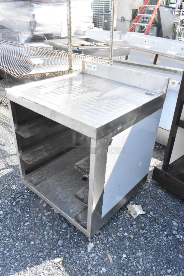 Regency 600GRSU2324C stainless steel drain board with under shelf, suitable for commercial use, in used condition.