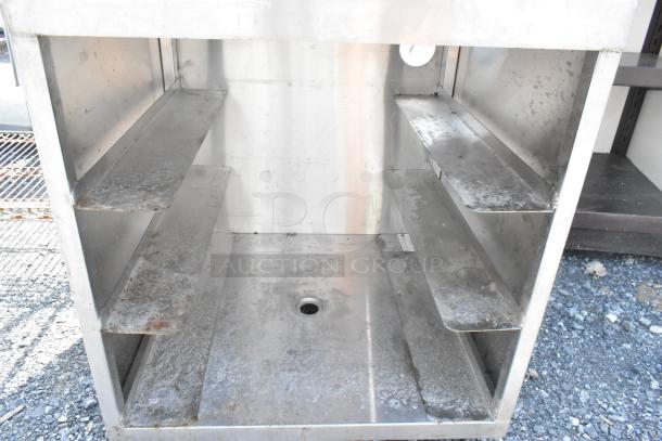 Regency 600GRSU2324C stainless steel drain board with under shelf, used condition, visible wear and rust, commercial-grade.