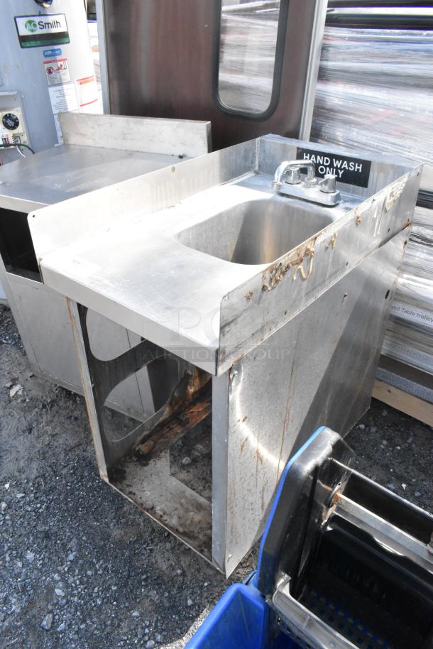 Stainless Steel Single Bay Sink with faucet and handles, showing rust and wear. Marked "Hand Wash Only."