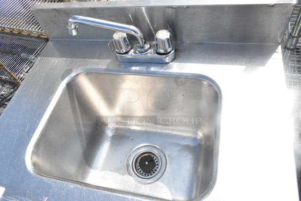 CustomCool stainless steel commercial single bay sink with faucet and dual handles, in good condition.