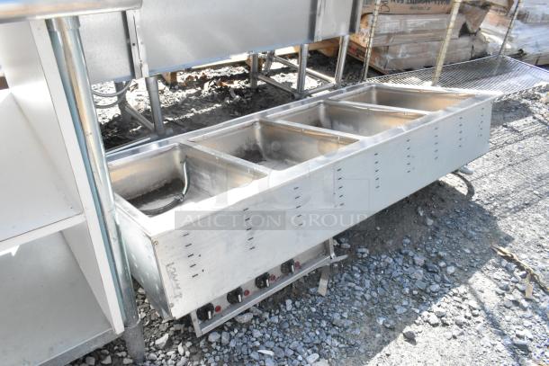 Vollrath 36406 stainless steel 4-bay drop-in steam table, commercial use, 100-120V, 1 phase, in used condition.