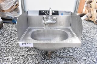 Stainless steel single bay wall mount sink with side splash guards, faucet, handles, and "Hand Wash Only" label.