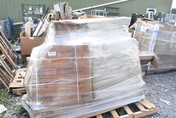 A wrapped pallet of 10 new scratch and dent items, including stainless tables, sneeze guard, tabletops, and chair seats.