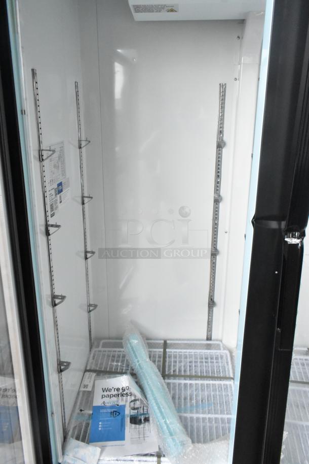 2025 Avantco 178GDC40HCB glass door merchandiser, 48", black, new scratch and dent, LED lighting, tags visible inside.
