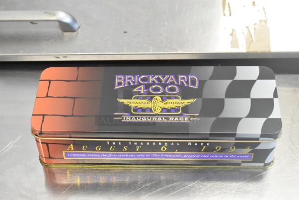Brickyard 400 Inaugural Race 1994 figurine in original box, featuring race details; mint condition.