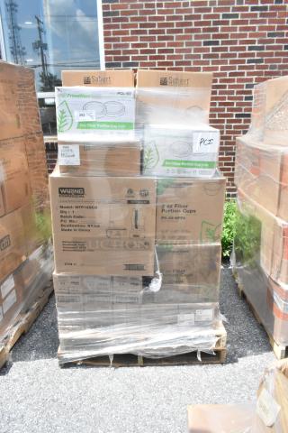 Boxes of PrimeWare and Sabert food containers and lids, new scratch and dent, on pallets. Labels indicate 2oz portion cup lids.