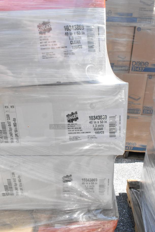 Stack of boxes labeled "Singer 10343869" containing coreless roll can liners, 40x53in, 1.3 mils, clear, 100 per case.
