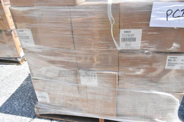 26 brand new scratch and dent boxes on a pallet, including napkins and platters, wrapped in plastic with visible labels.