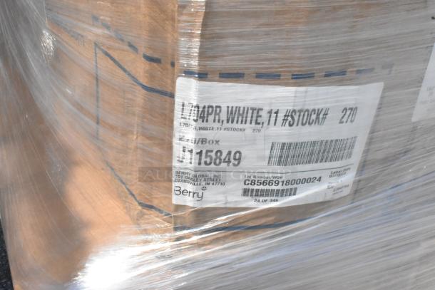 Pallet of 26 scratch and dent boxes with napkins and platters, wrapped in plastic. Label shows Berry Global and stock details.