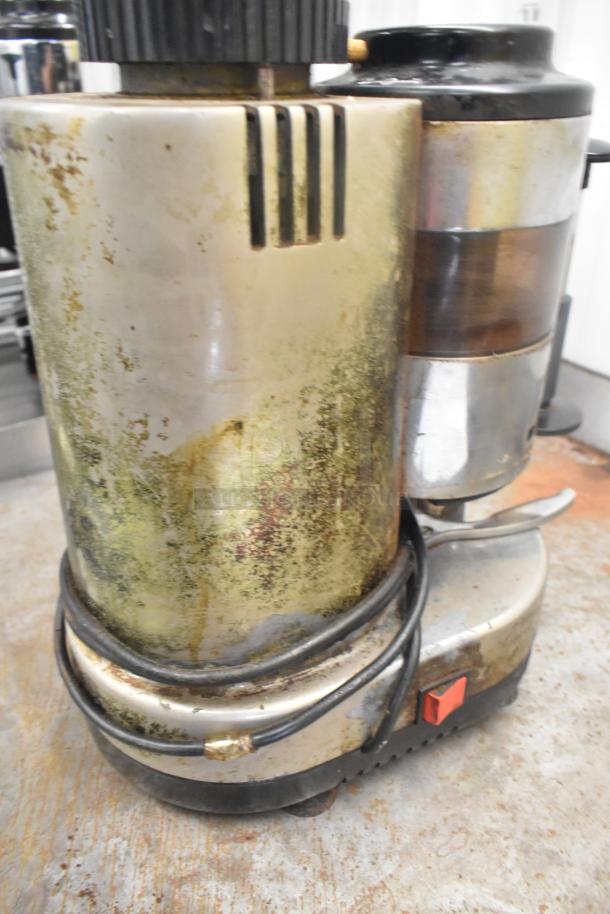 Rossi Metal Commercial Countertop Espresso Bean Grinder, 115V, 1 Phase. Visible wear and rust, red power switch.
