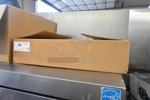 Brand new in box cards, including Brickyard 400 Inaugural Race 1994 card. Box labeled "PCAauctions.com," quantity 9.