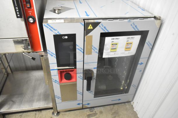 Brand new Blodgett AETG101R stainless steel commercial gas combi oven, scratch and dent condition, protective film intact.