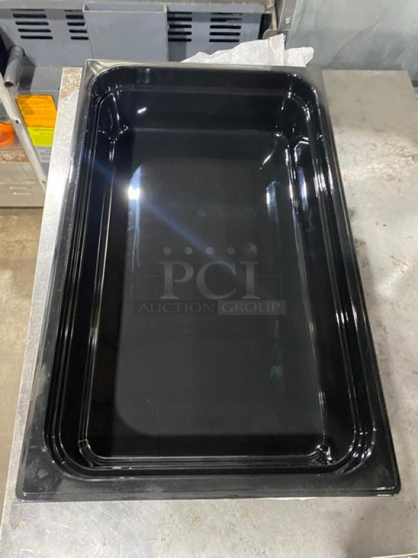 Carlisle Model 10201B black full-size food pan, new condition, rectangular shape, glossy finish.