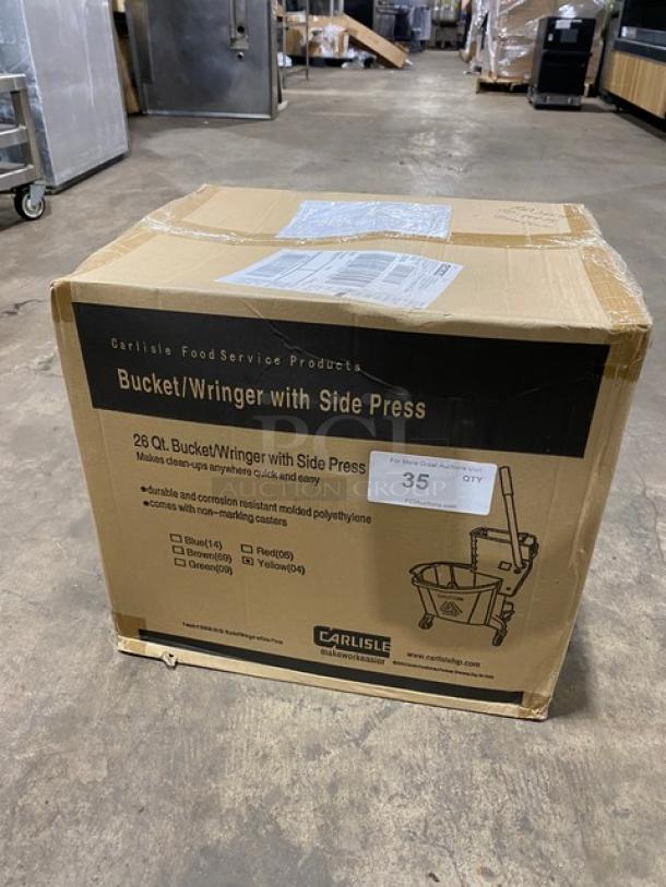 BRAND NEW! Carlisle Commercial Yellow Heavy Duty 26 Qt. Mop Bucket! With Side Press Wringer! On Casters! - Image 1 of 2