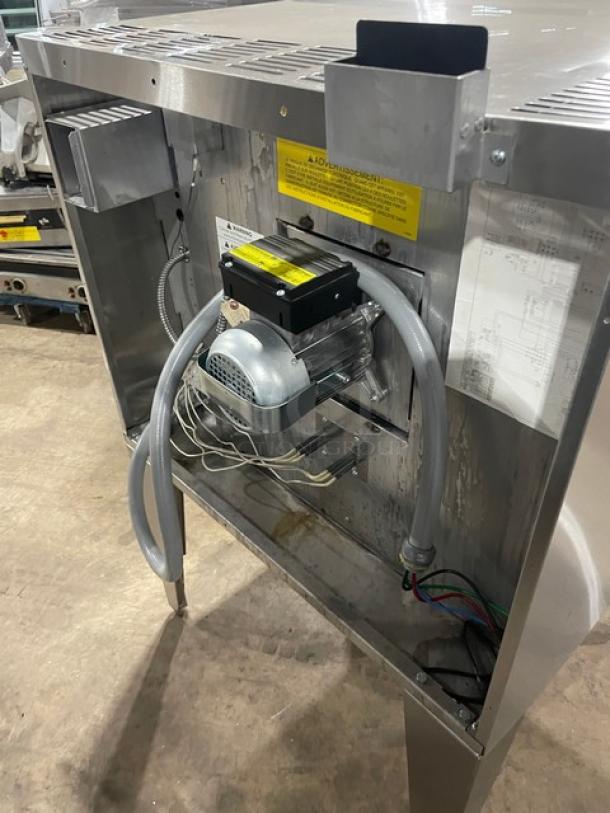 U.S. Range SUME100 convection oven back view showing motor and wiring, stainless steel finish, on legs, 208V 1 Phase.