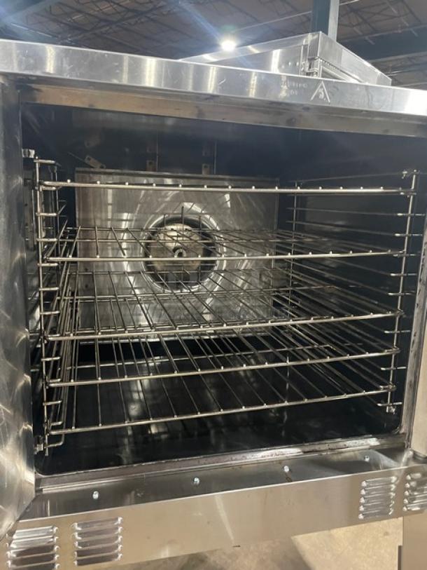 U.S. Range Summit Series stainless steel single deck convection oven, model SUME100, with wired racks and thermostatic controls.