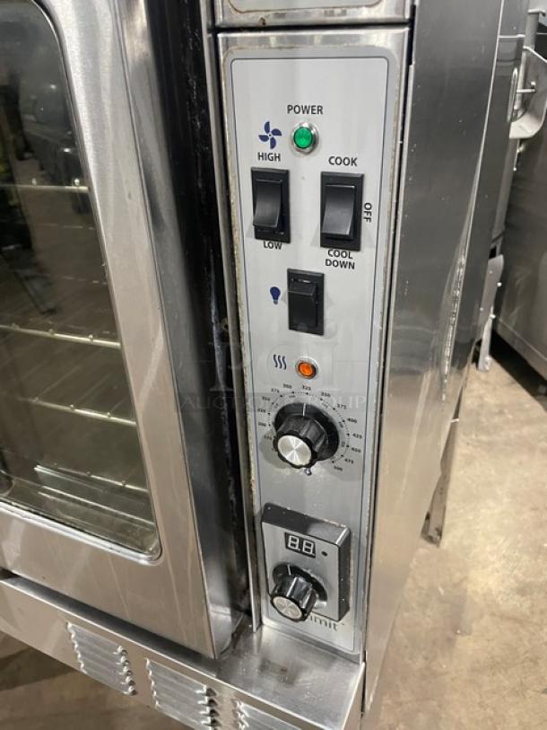 U.S. Range Garland SUME100 commercial convection oven, stainless steel, thermostatic controls, wired racks, 208V, 1 phase.
