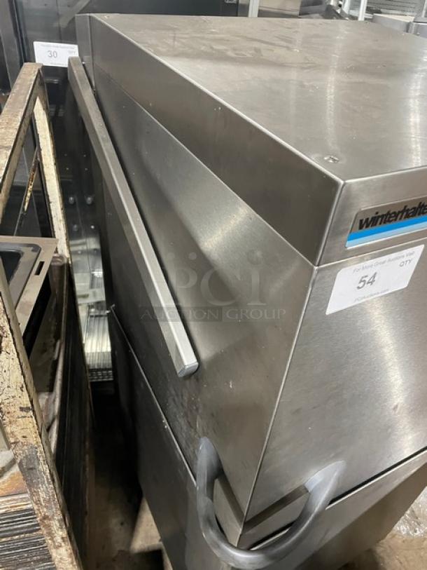 Winterhalter GS502 commercial stainless steel pass-through dishwasher with digital controls, 208V, on legs, model SN: 539963.