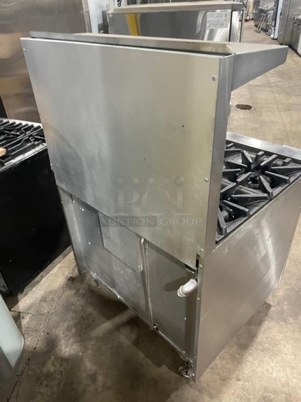 SunFire stainless steel 6-burner natural gas range/oven combo with backsplash, overhead salamander shelf, wired oven rack, on casters.