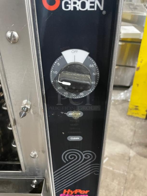 Groen HY3E stainless steel electric convection steamer with control dial, 3 pan capacity, and pan holding racks. Model: HY-3E.