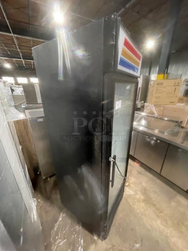 True GDM-23 black single glass door merchandiser refrigerator, poly-coated wire racks, good condition, 115V 1 Phase.