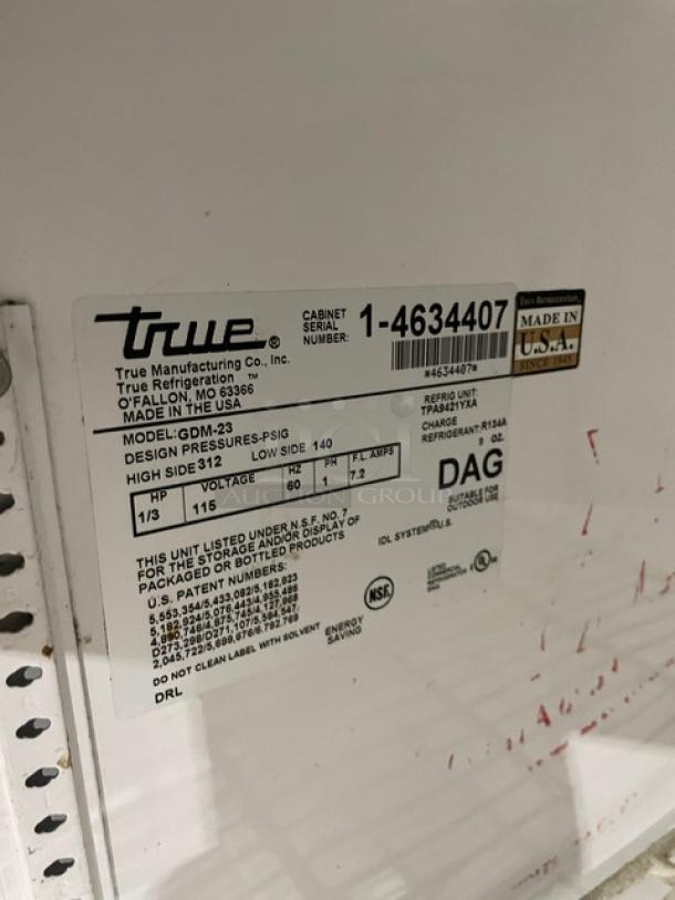 True GDM-23 Commercial Black Glass Door Refrigerator, poly coated wire racks, 115V 1 Phase, serial 1-4634407, NSF certified.