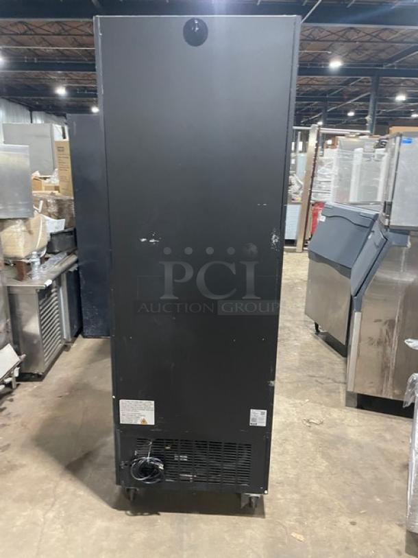 Avantco Commercial Black Single Glass Swing Door Reach-In Merchandiser Refrigerator, Model 178GDC23HCB, on casters.