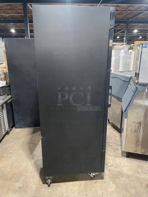 Avantco black single glass swing door merchandiser refrigerator, model 178GDC23HCB, on casters, poly coated wire racks.